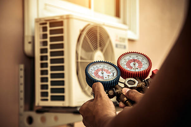Professional Air Conditioning Service technician working in Morgan, UT